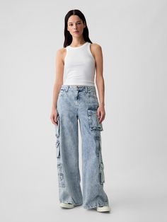 Fit: A full-length baggy jean that's fitted on the waist & relaxed all the way down.  ​ Fabric: 95% Cotton, 5% Recycled Cotton.  Stretch: No Stretch Jeans.  Authentic denim that gets better with every wear.  Made to wear all day & break in over time.  ​ Rise: Mid Rise Jeans.  Look: A cargo baggy jean in a light indigo wash.  ​ Details: Zip fly, five-pocket styling, & assorted cargo pockets at sides.  Responsibly Made: This pair of jeans is part of our water-saving Washwell program.  Compared with conventional wash methods, Washwell uses at least 20% less water and has saved over a billion liters of water since 2016.  Our Mid Rise Jean has a 10" 25 cm) rise. ​ Fitted at the waist and hip.  Loose, baggy through the leg.  Full-length jean.  Hits below the ankle. ​ Leg opening: 26" 66 cm) Inse Azul Indigo, Baggy Jean, Toddler Jeans, Jeans Look, Water Saving, Clothing Inspiration, Break In, Reference Photos, Mid Rise Jeans