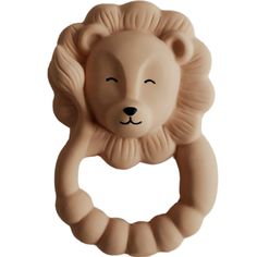 an animal shaped object is shown with its eyes closed and it's head in the shape of a lion