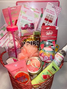 a pink basket filled with lots of different items