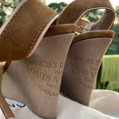 Absolutely Gorgeous Brown Louis Vuitton Wedge Sandals. The Heel Is Canvas And Upper Is Suede. Pictures Don’t Do These Justice! Brown Wedges, Louis Vuitton Shoes, Wedge Sandals, Women's Shoes Sandals, Shoes Sandals, Wedges, Louis Vuitton, Sandals, Women Shoes