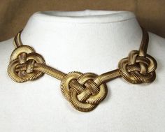 Triple Chinese Knot Necklace by Sarah Cavender. 16 long fern chain features 3 chinese-knot stations. 3 adjuster chain W. Shown in gold. Spider Repellant, Spider Repellent, Chinese Necklace, Knots Jewelry, Bead Weaving Patterns, Chinese Knot, Jewelry Showcases, Necklace Pendants, Artful Home