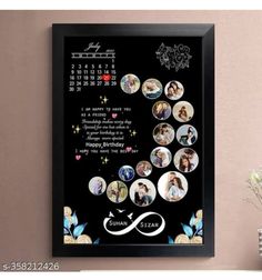 a black framed calendar with pictures on it