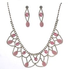 The necklace measures approximately 13" long with a 6" long extender Oval Crystal Jewelry With Rhinestones, Pink Crystal Jewelry Sets With Rhinestones, Pink Teardrop Rhinestone Jewelry, Teardrop Pink Rhinestone Jewelry, The Necklace, Light Rose, Half Circle, Rose Lights, Necklace Earring Set