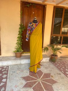 yellow georgette silk saree with hand embroidery Kalamkari blouse | silk saree with readymade blouse | sarees USA | pure light weight silk saree / red yellow saree with  stitched blouse / voggish / long sleeve maggam blouse      you are absolutely gonna fall in love with this unique modern  saree look with our stitched ready to wear blouses(includes the price) with a modern touch to them is perfect for your upcoming saree occassion that really makes you stand apart in crowd !!     You dont reall Kalamkari Silk Saree, Saree Red, Maggam Blouse, Kalamkari Blouse, Hand Embroidered Blouse, Haldi Outfit, Modern Saree, Maggam Work Blouses, Yellow Saree