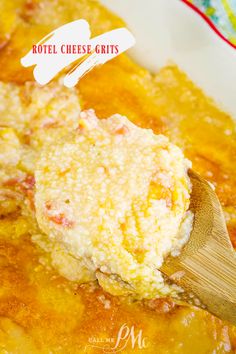 a wooden spoon scooping some food out of a casserole dish with cheese crumbs