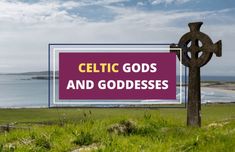 a sign that says celtic gods and goddesss in front of the ocean with an iron cross