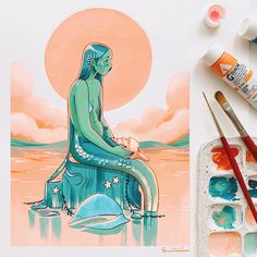 a painting of a mermaid sitting on top of a dolphin in the water with paintbrushes next to it