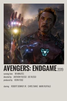 the avengers endgame movie poster with iron man holding his hand up in front of him