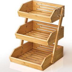 a wooden shelf with two drawers on top and one drawer open to show the bottom