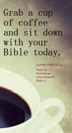 a cup of coffee sitting on top of a table next to a quote about coffee