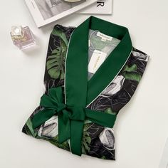 This robe set is made of lightweight silky satin, soft, breathable and skin-friendly, help you have a sound sleep. Material: Tropical Print Green Silky Satin Robe With Belt is made of 100% Polyester Color: Green Size: XS/S, M/L, XL/XXL *We recommend taking measurements before ordering lingerie. Different lingerie brands use different size charts, if you want the lingerie set to fit perfectly, please check the size chart below EASY CARE: This product is crafted from high quality fabrics, making i Green Satin Sleepwear For Summer, Silk Summer Sleepwear For Home, Long Sleeve Satin Robe For Summer, Long Sleeve Satin Summer Robe, Summer Silk Lounge Robe, Summer Silk Loungewear Robe, Summer Silk Robe For Sleep, Green Satin Sleepwear For Loungewear, Green Satin Sleepwear