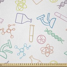 a white background with colorful science symbols and letters on the bottom half of it, as well as a ruler