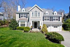 a large white house with lots of windows