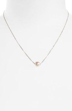 Nothing expresses understated elegance quite like pearls. This delicate pendant necklace has a slender chain and a single, luminous cultured pearl. 16" length; 2" extender; 3/8"W x 3/8"L pearl pendant Lobster clasp closure Pearl size: 8mm Akoya cultured pearl/18k white gold Handcrafted in Japan Asian Owned Elegant Single Strand Pearl Pendant Necklace, Elegant Single Strand Pendant Pearl Necklace, Minimalist Single Strand White Gold Pearl Necklace, Minimalist White Gold Single Strand Pearl Necklace, White Pearl Necklace With Delicate Chain For Formal Occasions, Delicate White Gold Pearl Drop Necklace, Dainty White Gold Single Strand Pearl Necklace, Dainty White Gold Pearl Drop Necklace, Elegant Solitaire Necklace With Cable Chain