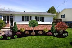 a house with landscaping in the front yard