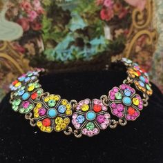 Michal Negrin Bracelet & Colorful Swarovski Crystal Victorian Flower Gift Box 7" | eBay Bohemian Jeweled Crystal Bracelet As Gift, Costume Jewelry Jeweled Bracelets For Gift, Vintage Multicolor Jewelry With Flower Charm, Jeweled Costume Jewelry Bracelets For Gift, Costume Jewelry Crystal Bracelet For Gift, Adjustable Multicolor Jeweled Bracelets, Multicolor Metal Bracelets With Rhinestones, Multicolor Rhinestone Bracelet Jewelry, Multicolor Party Jewelry With Flower Shape