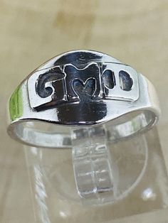 Vintage sterling silver Leonore Doskov Signed Initial GMD. Condition: Pre-Owned. Symbolic Silver Sterling Engraved Ring, Nickel-free Engraved Sterling Silver Ring For Anniversary, Symbolic Stamped Sterling Silver Rings, Symbolic Sterling Silver Stamped Rings, Silver Sterling Silver Engraved Promise Ring, Silver Engraved Nickel-free Ring For Anniversary, Nickel-free Silver Engraved Ring For Anniversary, Adjustable Sterling Silver Signet Ring For Promise, Sterling Silver Ring With Hallmarks