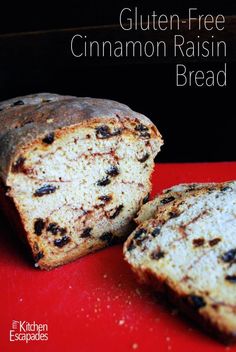 two pieces of bread sitting on top of a red cutting board with the words gluten - free cinnamon raisin bread