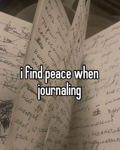 an open book with writing on it and the words i find peace when journaling