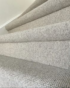 a close up view of some carpeted stairs