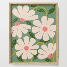 a green background with white flowers and leaves framed in a wooden frame on the wall