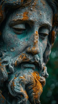 a close up of a statue with rusted paint on it's face and beard