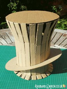 a cardboard hat sitting on top of a table