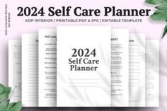 the self care planner is shown with green leaves around it