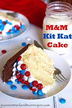 a piece of cake with red, white and blue decorations on it is sitting on a plate