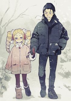 a man and woman walking in the snow