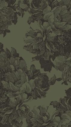 a black and green floral wallpaper with large flowers