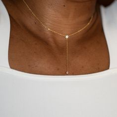 Simplicity with a little spice. Darnell is a 15" Y style lariat necklace with cubic zirconia set stones. Gold colored rhodium plated-over-brass with a lobster clasp closure and 2" extender. Necklace Bridal, Lariat Necklace, Rhodium Plated, Lobster Clasp, Necklace Etsy, Gold Color, Cubic Zirconia, Gold Necklace, Accessory Gift