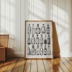 a black and white photo of bottles on a wall