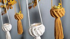 three macrame hangings with yellow flowers on the top and one has a candle in it