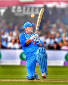 a man holding a baseball bat on top of a field in front of a crowd