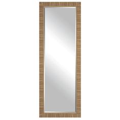 a tall wooden mirror on a white wall