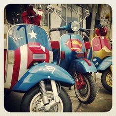 two scooters are painted in the colors of the american flag and red, white, and blue