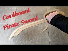 How to make a DIY Cardboard Pirate Sword - YouTube Pirate Swords Diy Cardboard, Cardboard Swords Diy, Pirate Swords Diy, Painted Sticks Diy, Pirate Costume Accessories, Aladdin Jr, Diy Pirate, Costume Accessories Diy, Diy Cans