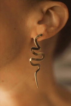 Make a statement in these swirling, snake-like earrings that drip from your ears like ribbons of cascading water. Lightweight but impactful, these modern Medusa earrings catch the light in the most elegant, seductive way. Modern Medusa, Medusa Earrings, Snake Jewelry, The Light, Favorite Jewelry, Fashion Jewelry, Ribbon, Water, Gifts