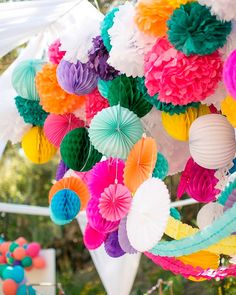 colorful paper decorations hanging from the ceiling