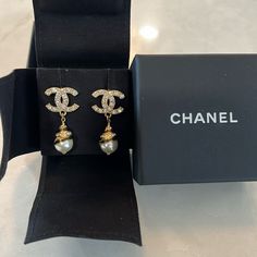 Only Worn Once. 100% Authentic Chanel Earrings, Purchased Brand New. Gold, Black, And Pearl. For Pierced Ears, Absolutely No Scratches Or Marks, In Perfect Condition. Designer Gold Drop Pearl Earrings, Designer Gold Pearl Drop Earrings, Designer Drop Earrings For Formal Occasions, Designer Dangle Earrings For Evening, Designer Dangle Earrings For Formal Events, Designer Dangle Earrings For Formal Occasions, Luxury Dangle Earrings, Luxury Black Pearl Earrings Gift, Luxury Black Pearl Earrings For Gift