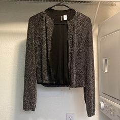 Brand: Divided Size: Us 4 Color: Black Lining, Metallic Body Material: 85% Polyamide, 10% Metal, 5% Elastane Zipper Closure Never Worn Fall Party Tops With Zipper Closure, Fall Party Top With Zipper Closure, Winter Long Sleeve Cropped Jacket For Night Out, Casual Long Sleeve Cropped Jacket For Party, Bomber Jackets, Cardigan Jacket, Cardigans, Divider, Bomber Jacket