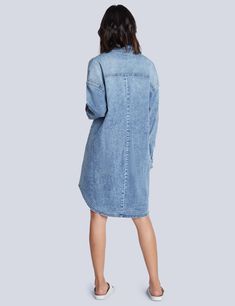 This utility shirtdress is cut from stretchy denim and meant to be worn whenever you're feeling extra-cute and carefree - AKA, everyday! Denim Blue Chambray Knee-length Dress, Knee-length Denim Blue Chambray Dress, Long Sleeve Medium Wash Denim Dress For Day Out, Trendy Chambray Denim Dress In Medium Wash, Denim Blue Chambray Dress, Trendy Medium Wash Chambray Denim Dress, Relaxed Fit Mini Length Denim Dress In Medium Wash, Relaxed Fit Medium Wash Denim Mini Dress, Medium Wash Relaxed Fit Mini Denim Dress