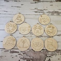 twelve wooden christmas ornament hanging on a wall