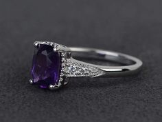 Welcome to my shop, you can find many beautiful gemstone jewelry here, and you also can ask for customized service. Main Stone: natural amethyst, cushion cut, measures 6X8 mmAccent Stones: czMetal: 925 sterling silver plated with rhodium so as to protect the ring from tarnish and keep it shinning. I also can provide metal options such as 14k solid yellow/white/rose goldSetting: prong setting more rings: https://www.etsy.com/shop/XCjewelryStudio?ref=hdr_shop_menuIt's a perfect gift for the person Elegant Cushion Cut Amethyst Ring, Elegant Purple Cushion Cut Amethyst Ring, Cushion Cut Purple Amethyst Ring, Cushion Cut Amethyst Ring For Weddings, Purple Cushion Cut Wedding Rings, Wedding Cushion Cut Purple Ring, Wedding Purple Cushion Cut Rings, Cushion Cut Amethyst Ring In Purple, Purple Amethyst Engagement Ring