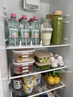 an open refrigerator filled with lots of food