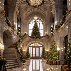 the lobby is decorated with christmas trees and presents