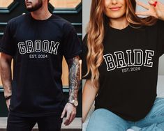 two people wearing matching shirts and jeans, one with the word bride on it's chest