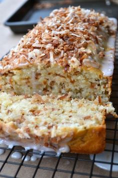 a loaf of cake sitting on top of a cooling rack