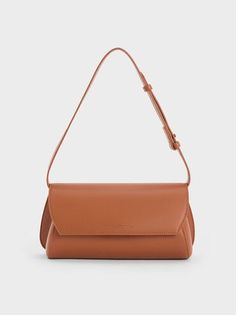 Tan Cassiopeia Front Flap Shoulder Bag | CHARLES & KEITH Modern Brown Flap Bag For On-the-go, Modern Brown Flap Bag With Large Capacity, Modern Large Capacity Brown Flap Bag, Modern Everyday Flap Bag With Large Capacity, Modern Brown Baguette Bag With Large Capacity, Modern Brown Baguette Bag For Shopping, Modern Brown Flap Bag For Everyday, Modern Everyday Brown Flap Bag, Modern Large Capacity Brown Baguette Bag